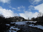 SX02452 Glendalough St Kevin's Church and Round Tower in snow.jpg